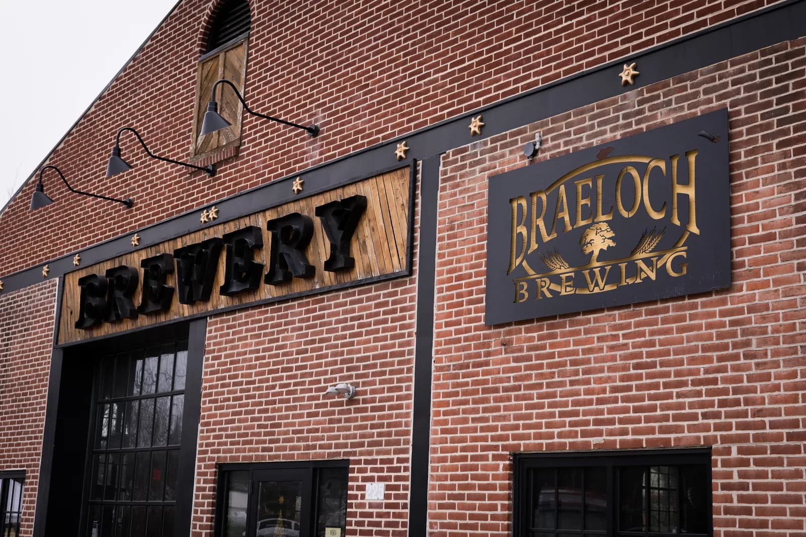 The Braeloch Brewing sign on the brick facade